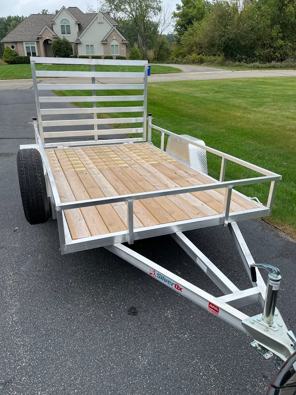 Silver Ox utility trailer fresh delivery at Michigan customer home