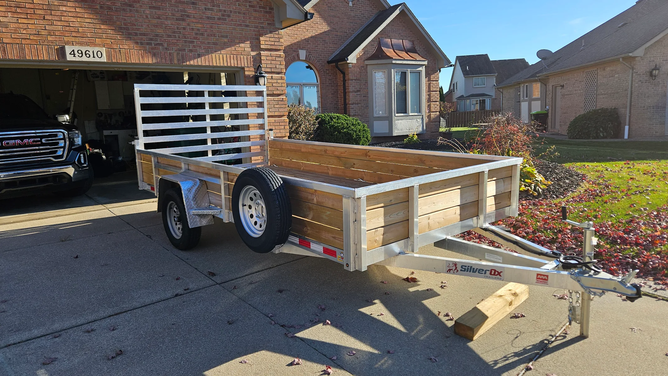 Silver Ox Woody wood-sided trailer at Michigan customer home in fall